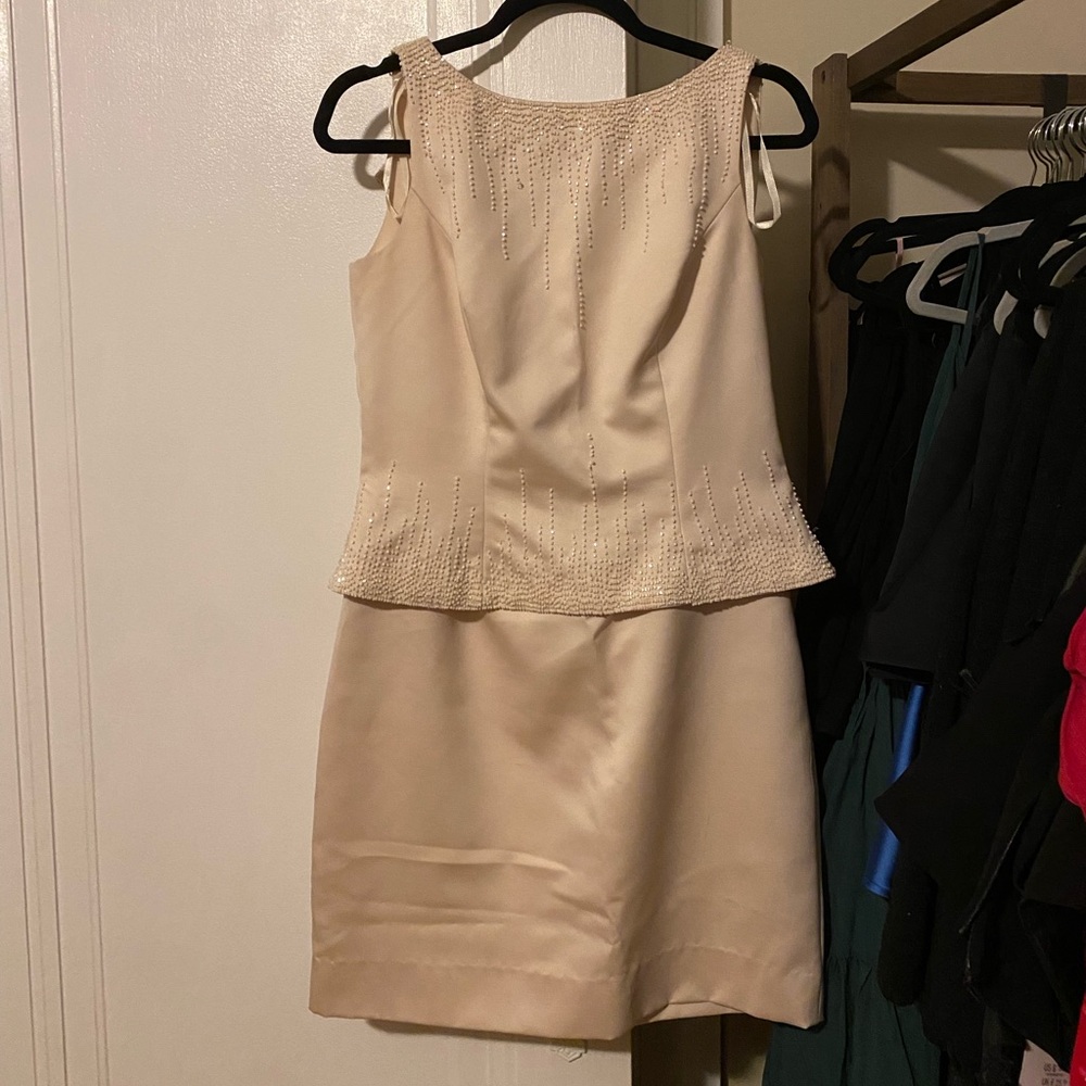 Elegant Cream Sleeveless Dress by Marie St. Claire